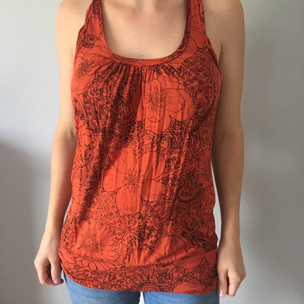 Orange top with black floral design